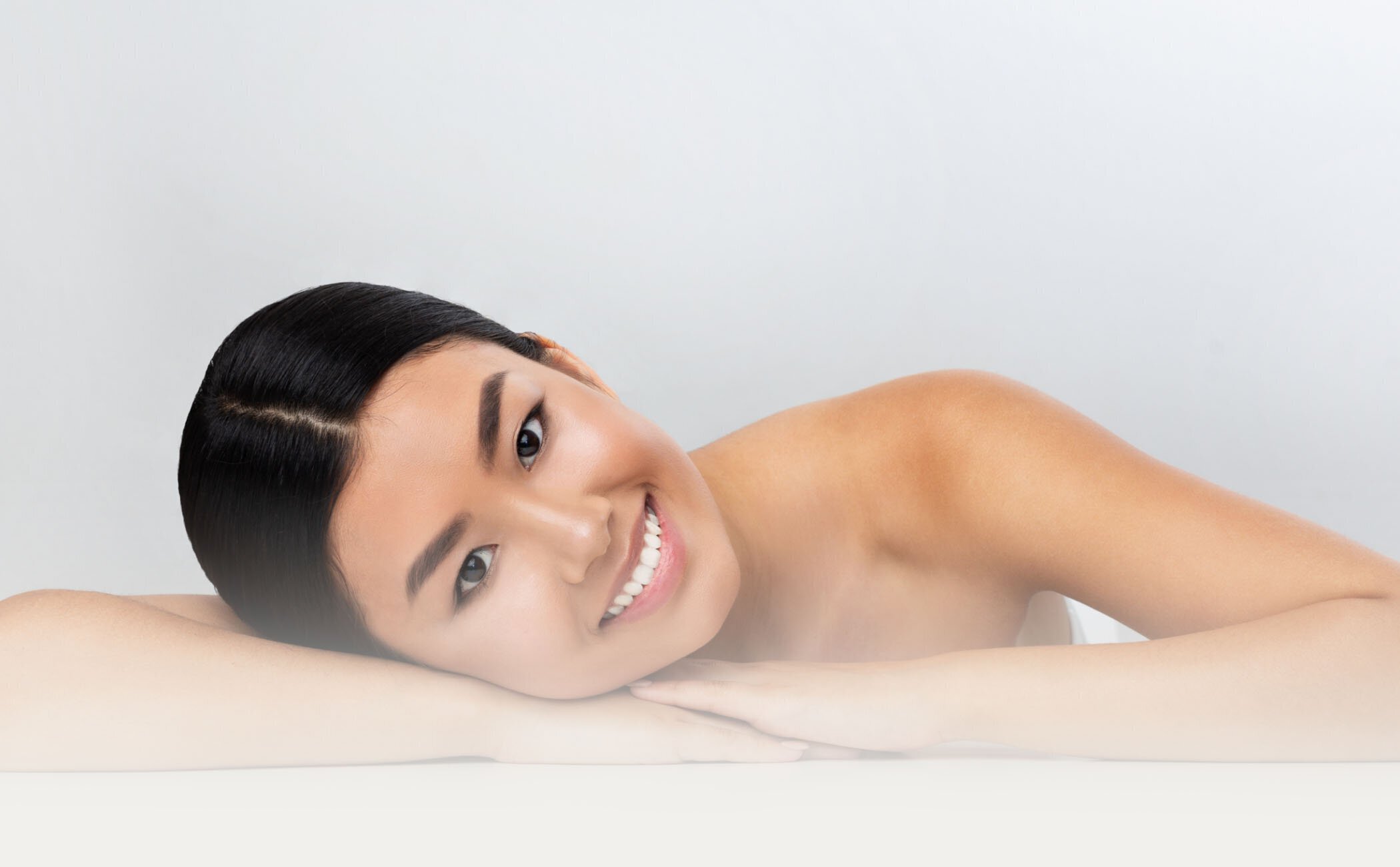 Happy woman after Sculptra treatments