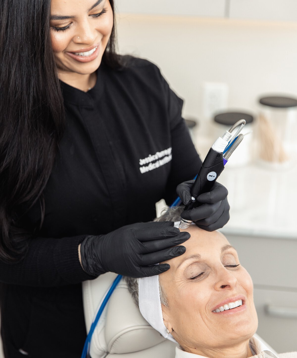 San Jose & Palo Alto HydraFacial model receiving treatment