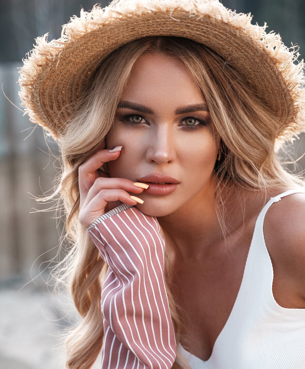 Palo Alto & San Jose Jan Marini Skin Research model with tan hat