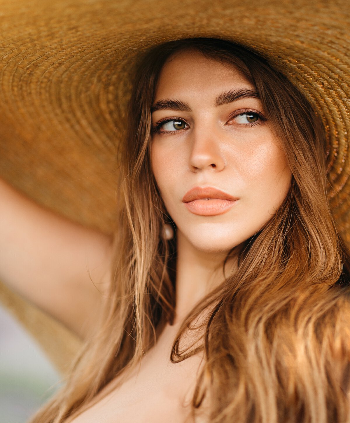 Palo Alto non surgical rhinoplasty model with tan hat